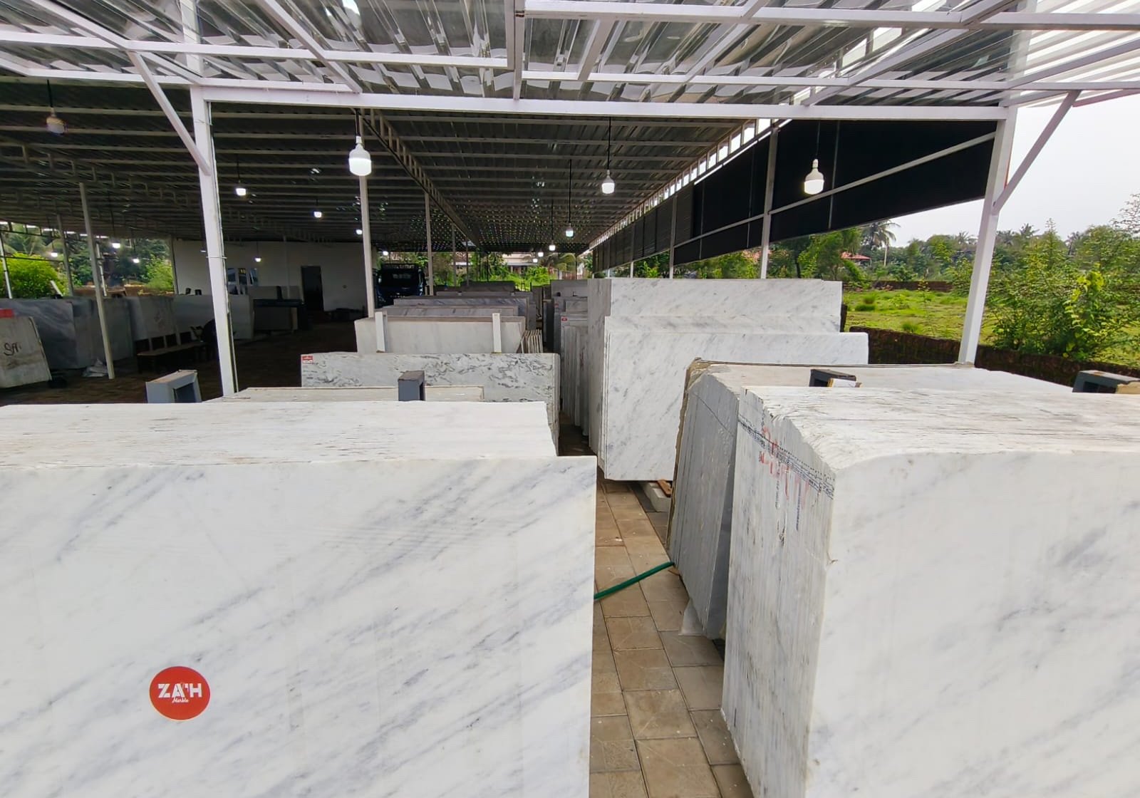 White marble blocks stacked under the covered yard